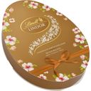 Lindt LINDOR Oster-Blüten Karton Ei Assortiert - 150 g